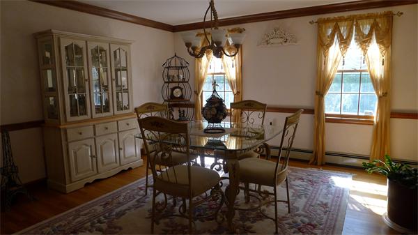 20 Willow Road Boxford, MA 01921 - Photo 10 of 15 a view of a dining room with furniture window and wooden floor