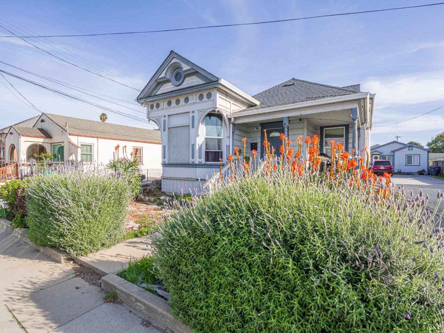 140 East Riverside Drive Watsonville, CA 95076 - Photo 2 of 49 a front view of a house with garden