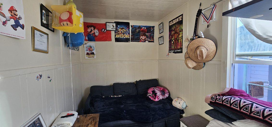 140 East Riverside Drive Watsonville, CA 95076 - Photo 24 of 49 a living room with furniture and wall paintings