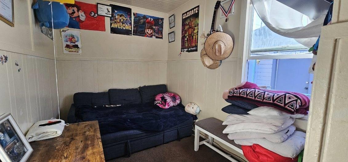 140 East Riverside Drive Watsonville, CA 95076 - Photo 26 of 49 a living room with furniture and a mirror