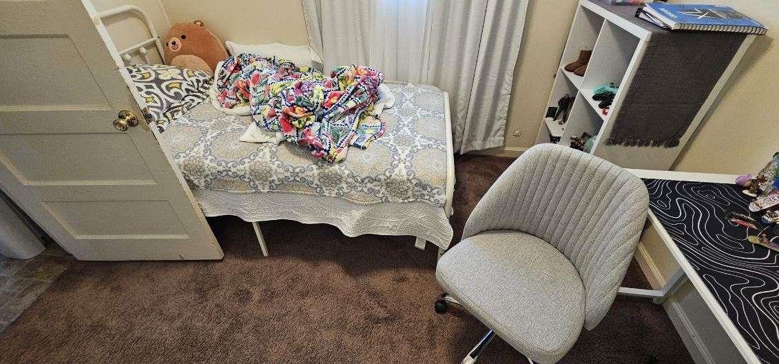 140 East Riverside Drive Watsonville, CA 95076 - Photo 32 of 49 a living room with furniture and a painting on the wall