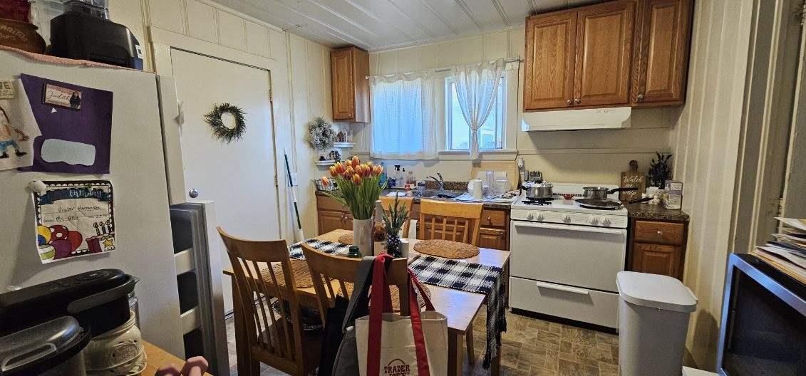 140 East Riverside Drive Watsonville, CA 95076 - Photo 43 of 49 a view of a dining room with furniture and a window