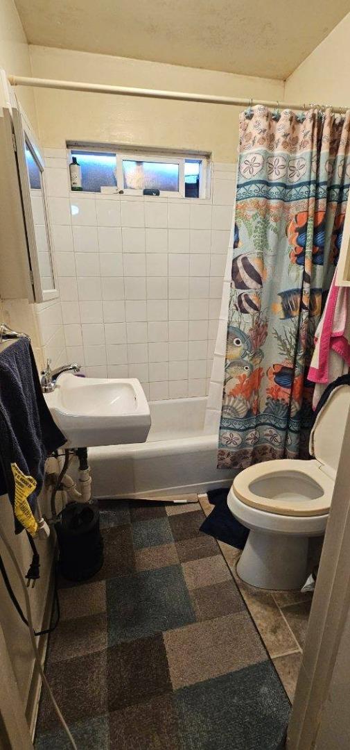 140 East Riverside Drive Watsonville, CA 95076 - Photo 48 of 49 a bathroom with a toilet and a shower