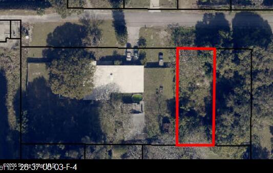 0 Unknown Street Melbourne, FL 32904 - Photo 4 of 16 a view of entryway and flowers