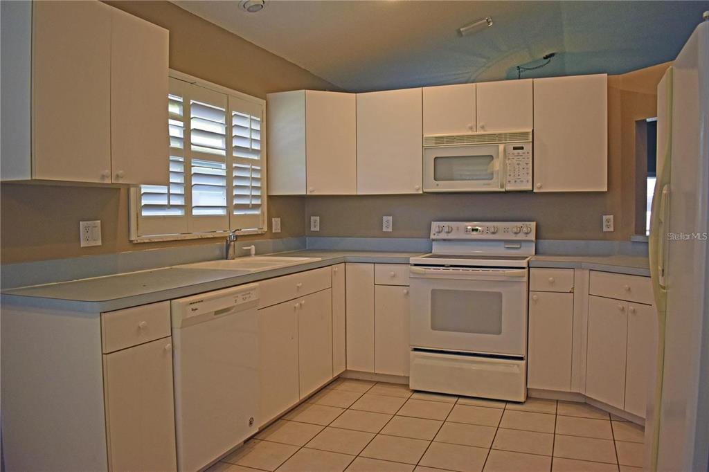 14499 Tamarind Loop Spring Hill, FL 34609 - Photo 6 of 25