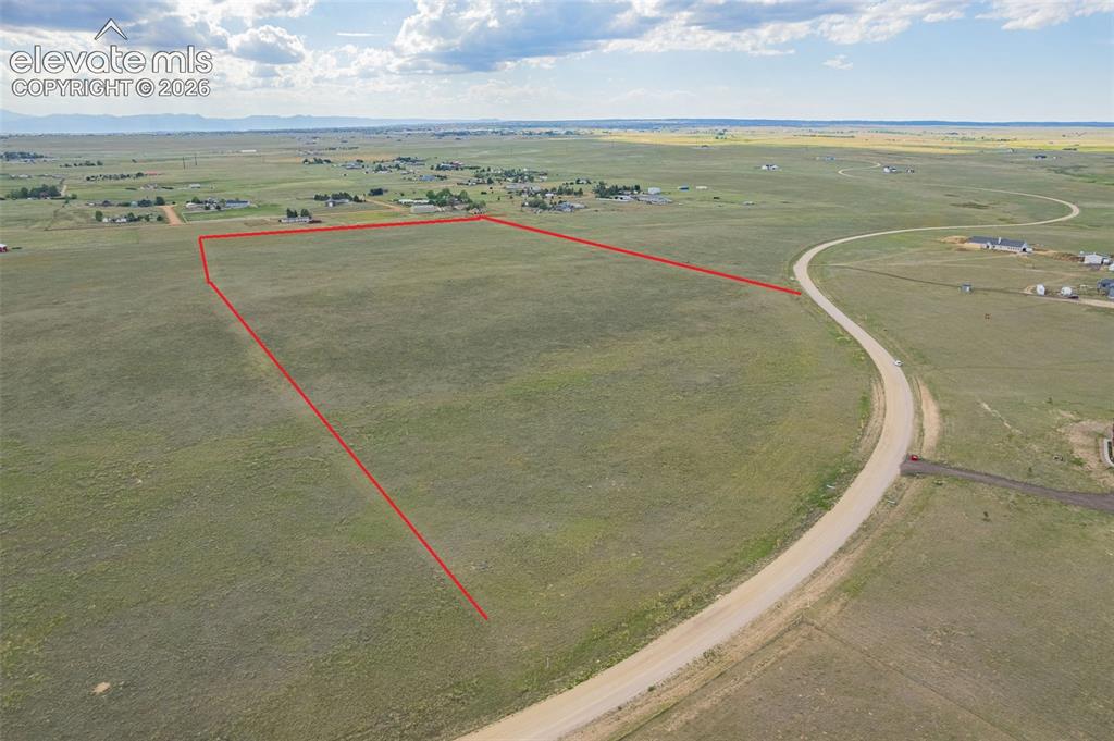 6870 Cowboy Rnch View Peyton, CO 80831 - Photo 4 of 16 a view of outdoor space and ocean view