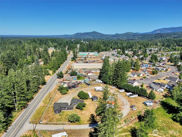 a view of a swimming pool with a yard