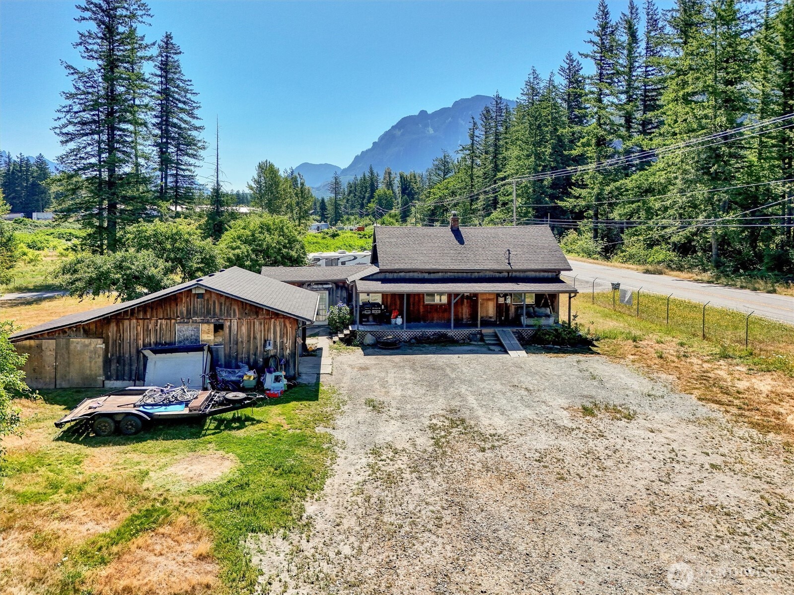 41109 State Rte 2 Gold Bar, WA 98251 - Photo 17 of 22 a view of a house with garden and sitting area