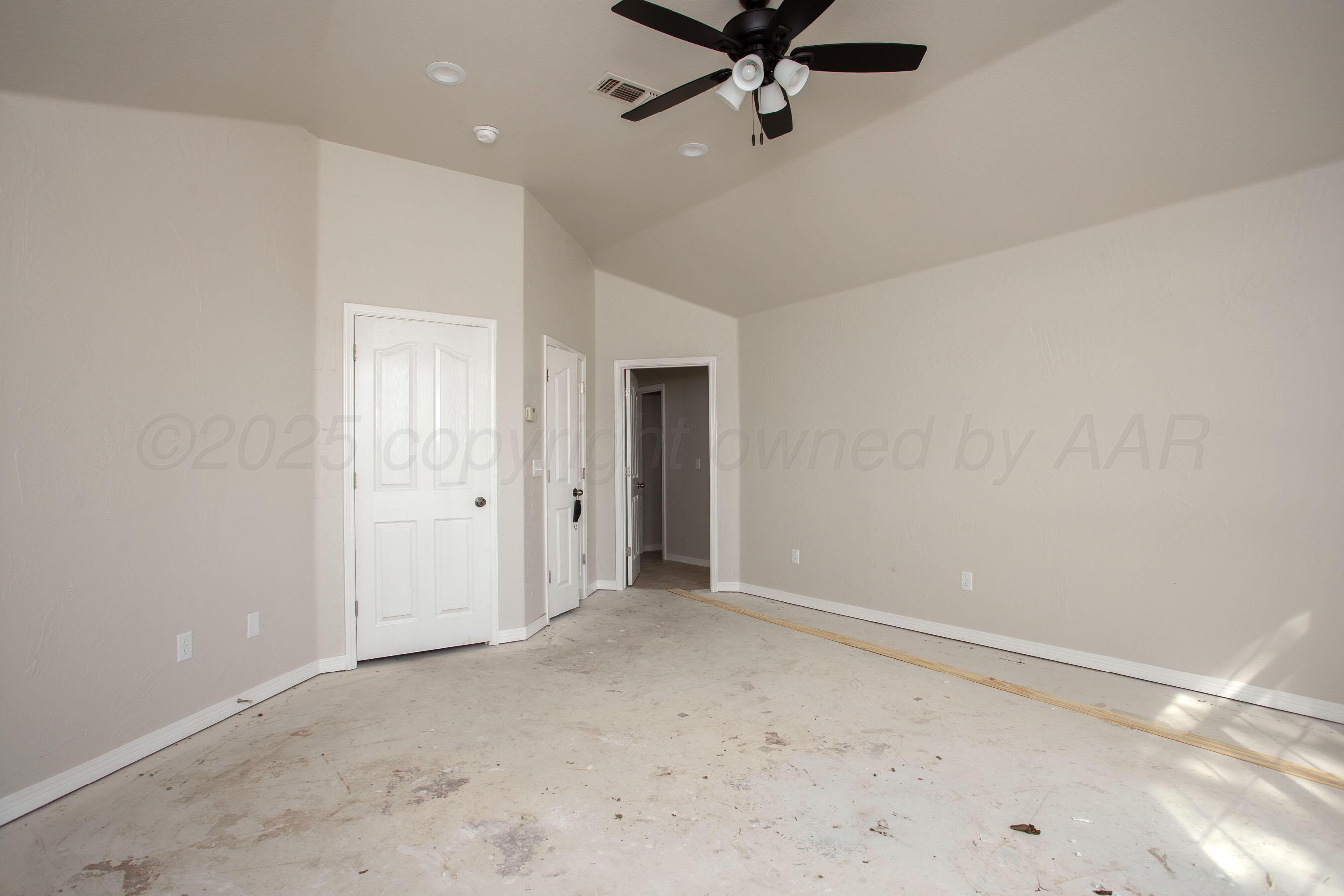 9050 Greyhawk Road Amarillo, TX 79119 - Photo 24 of 55 a view of a room with a ceiling fan