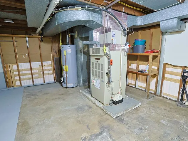 a view of a house with a door and wooden walls