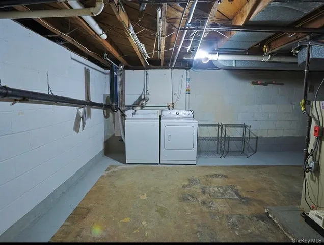 a view of a house with a snow in front of yard