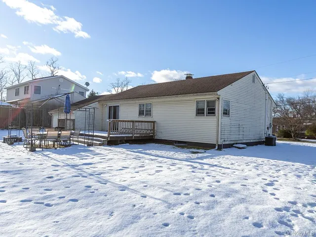 a view of a city with lawn chairs