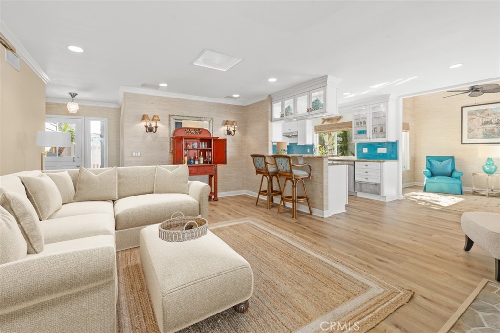 24115 Gourami Bay Dana Point, CA 92629 - Photo 3 of 39 a living room with furniture and kitchen view