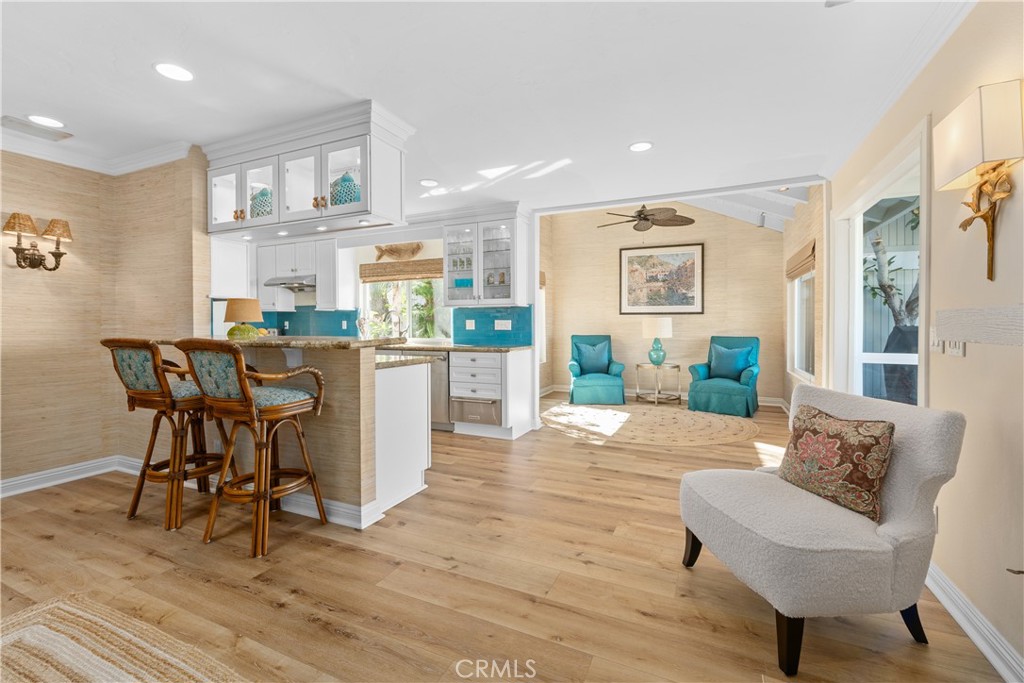 24115 Gourami Bay Dana Point, CA 92629 - Photo 6 of 39 a view of a dining room with furniture and wooden floor