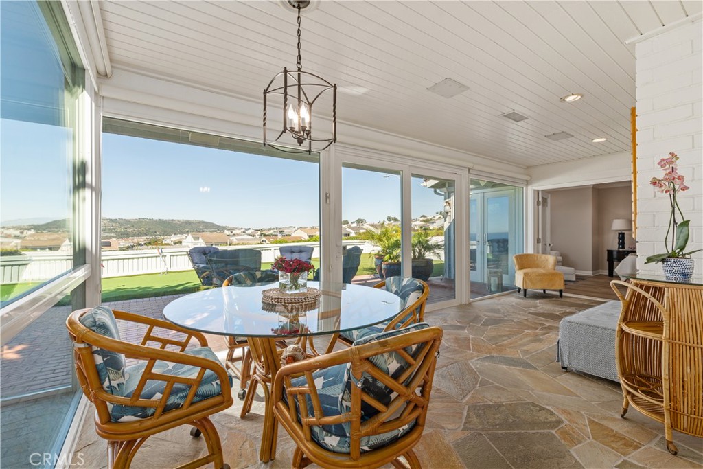 24115 Gourami Bay Dana Point, CA 92629 - Photo 10 of 39 a view of a dining room with furniture window and outside view