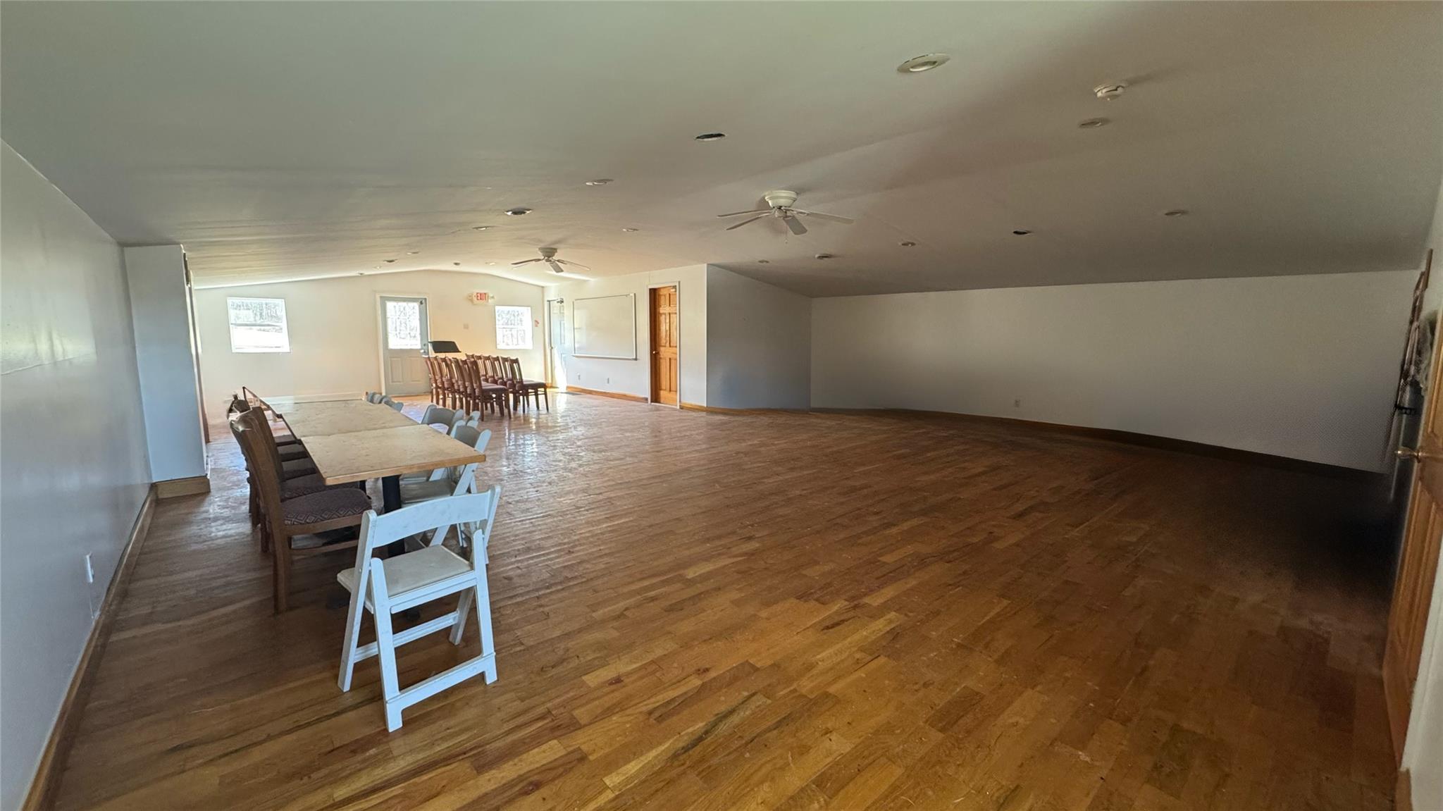 892 Bowbell Road Greene, NY 13778 - Photo 19 of 35 Dining space with lofted ceiling, wood finished floors, and ceiling fan