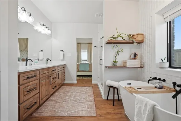 a kitchen with stainless steel appliances granite countertop a refrigerator and a stove