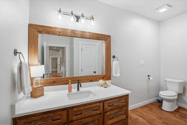 a view of swimming pool with outdoor seating and plants