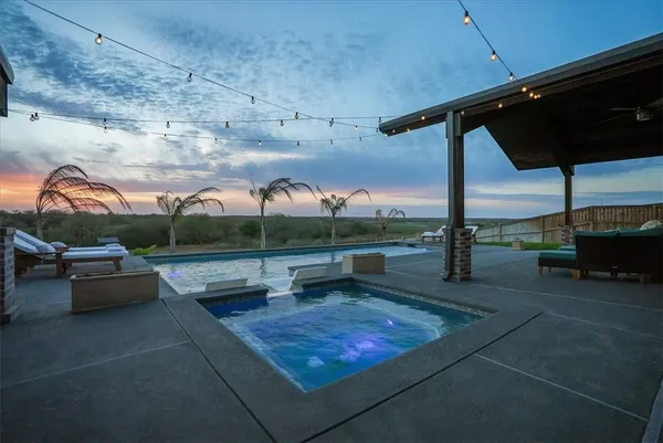 a view of a lake with a yard