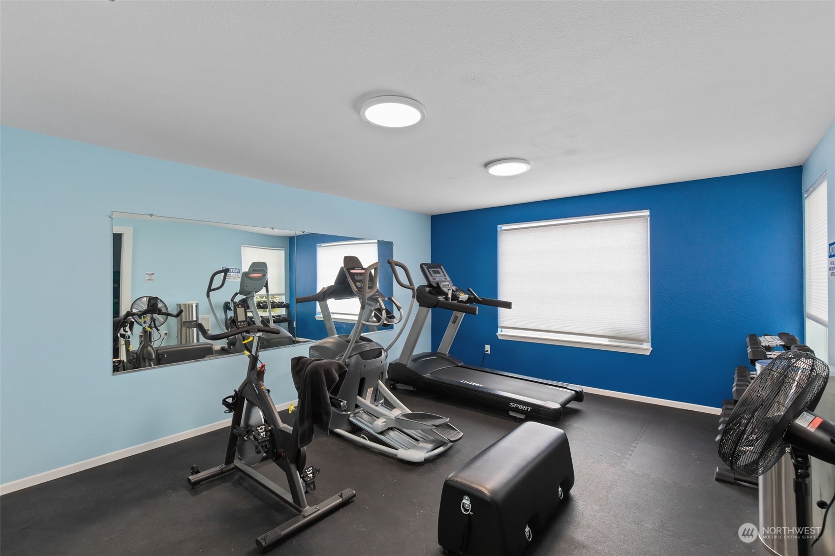 11002 Southeast Petrovitsky Road, Unit E101 Renton, WA 98055 - Photo 36 of 40 a view of a workspace with furniture and a window