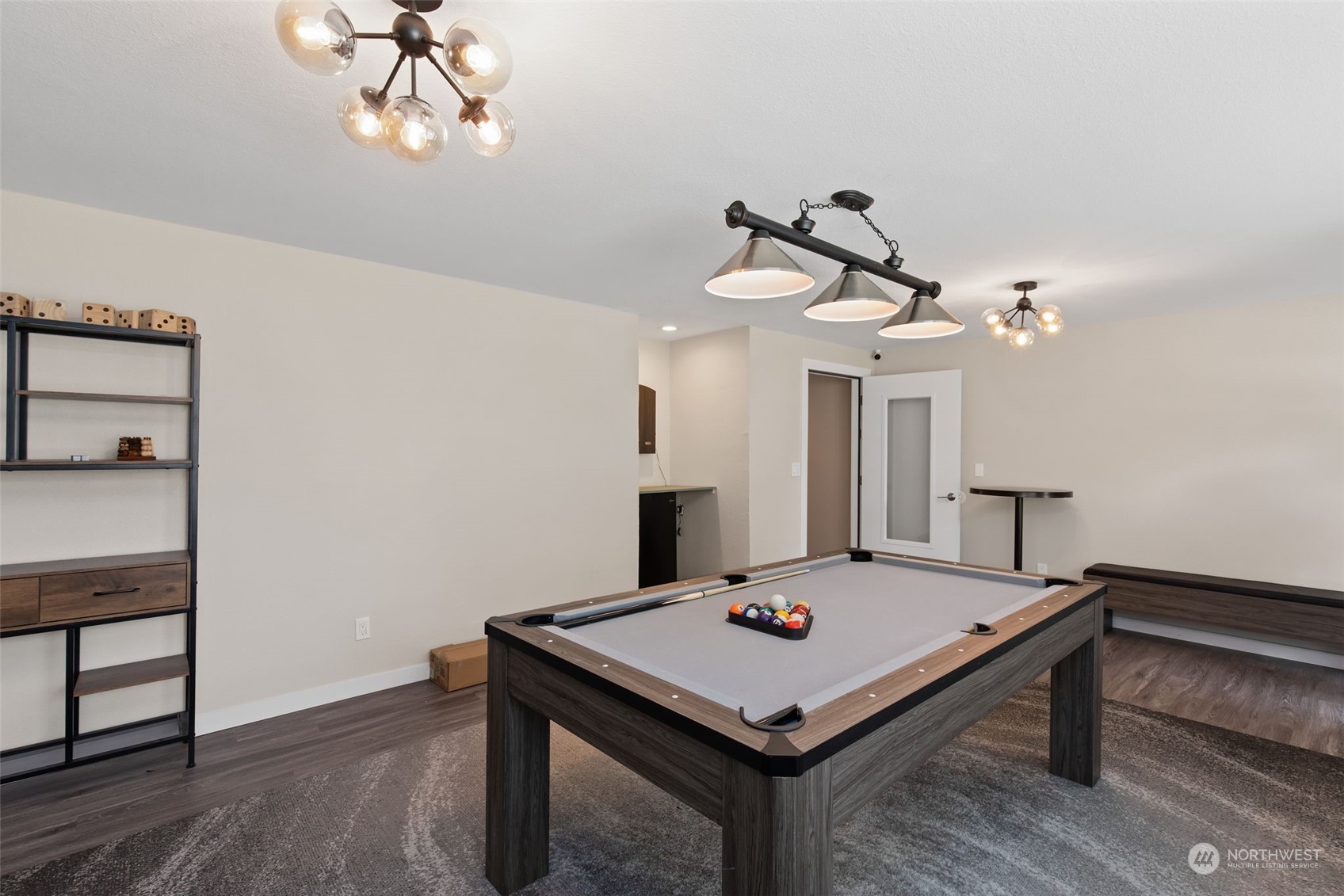 11002 Southeast Petrovitsky Road, Unit E101 Renton, WA 98055 - Photo 38 of 40 a view of a room with a table & chairs