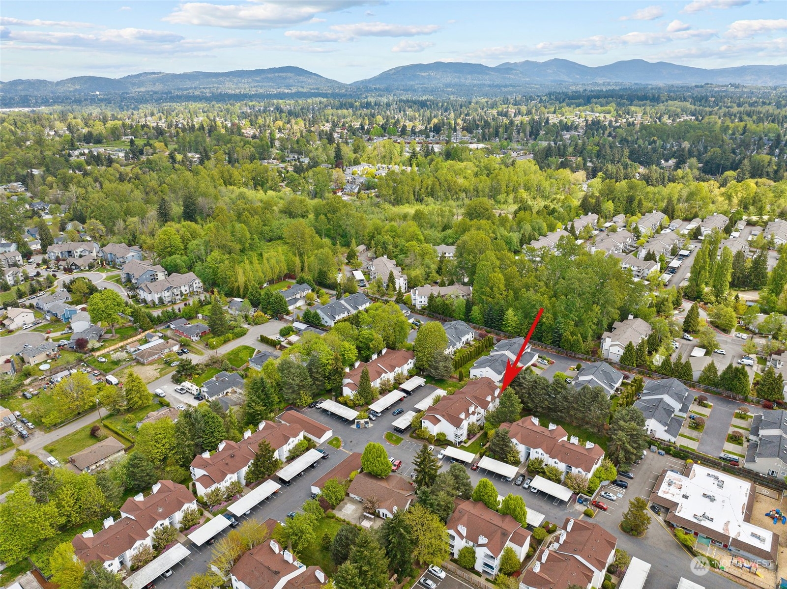 11002 Southeast Petrovitsky Road, Unit E101 Renton, WA 98055 - Photo 39 of 40 a view of lake and mountain