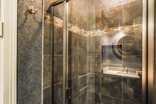 a view of an empty room with a cabinet