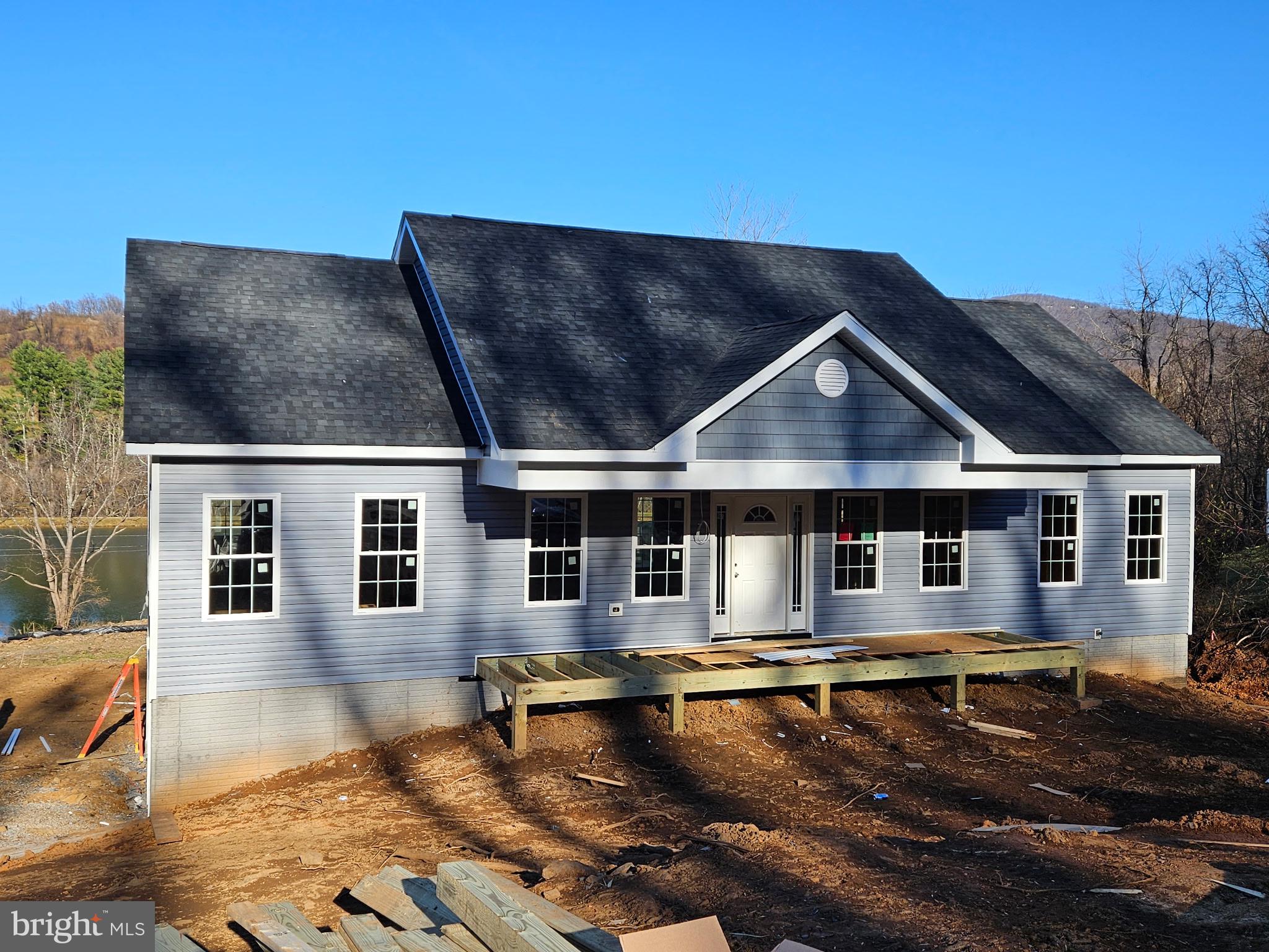 8 Creek Road Front Royal, VA 22630 - Photo 25 of 45 a front view of a house with swimming pool