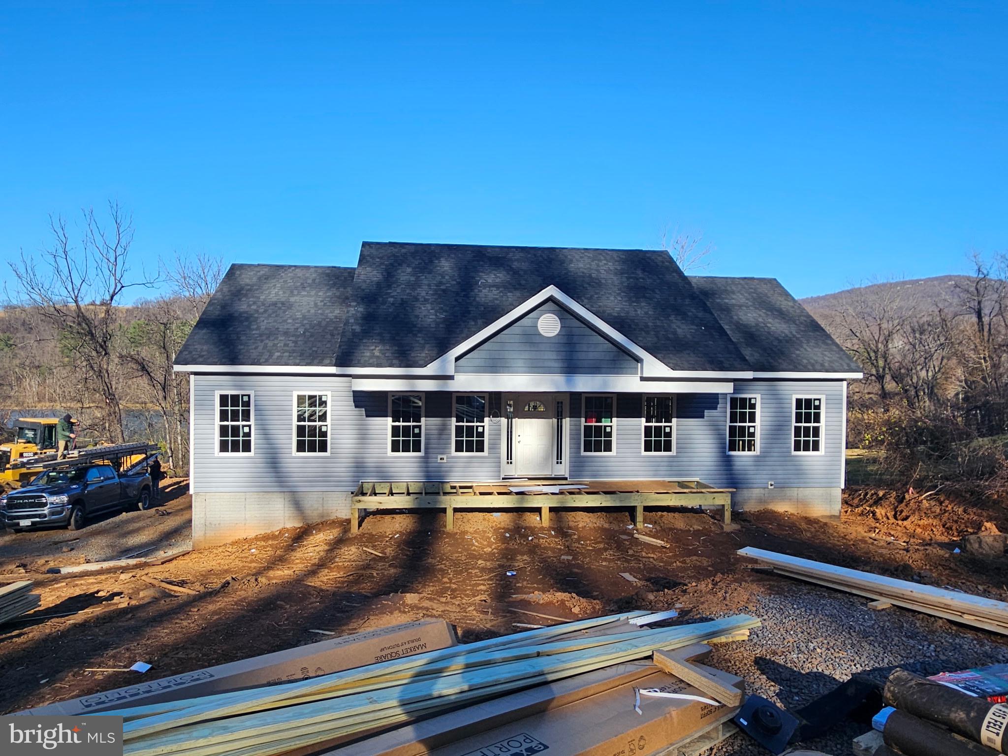 8 Creek Road Front Royal, VA 22630 - Photo 26 of 45 a front view of residential houses with yard