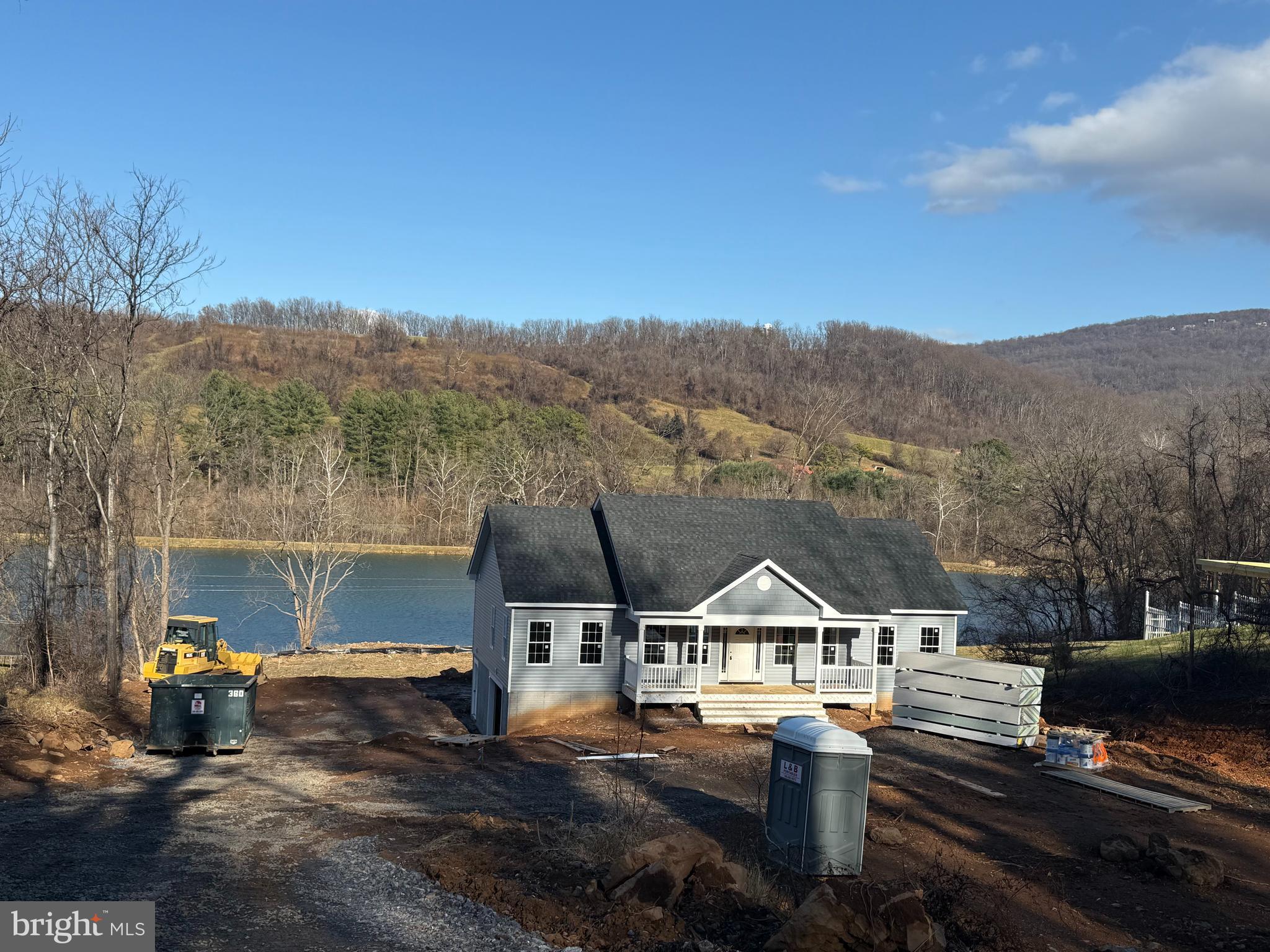 8 Creek Road Front Royal, VA 22630 - Photo 3 of 45 a front view of a house with a yard