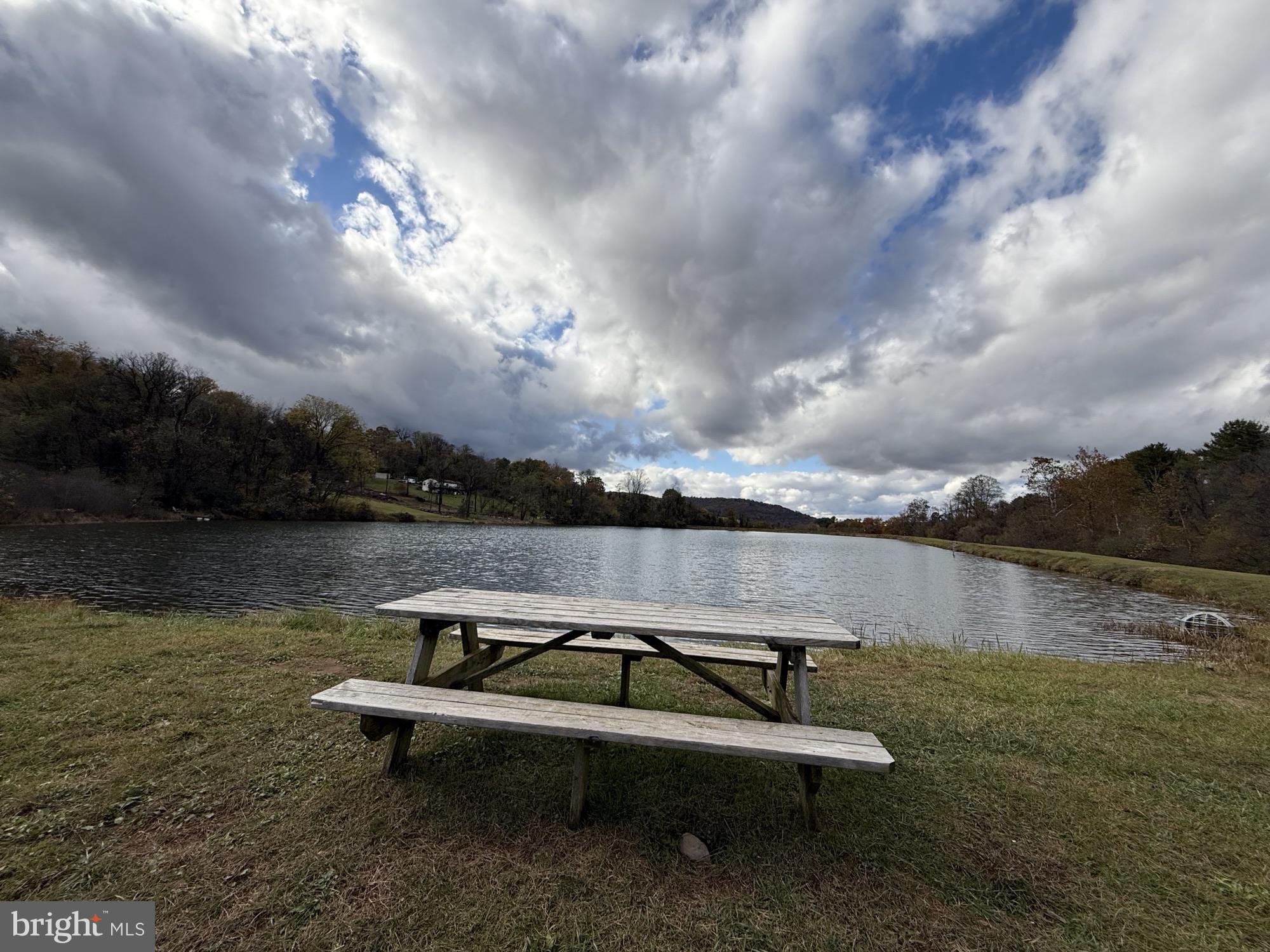 8 Creek Road Front Royal, VA 22630 - Photo 43 of 45 a view of a lake with outdoor seating