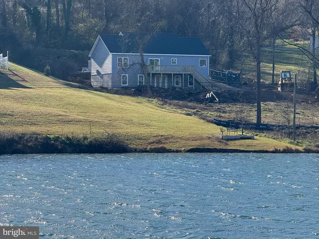 a view of a house with swimming pool