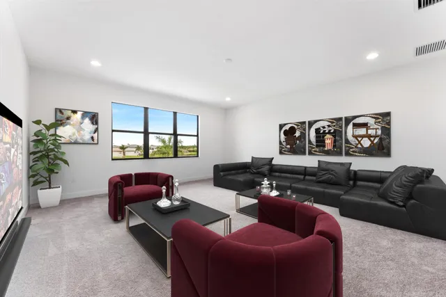 a view of a lake with houses in the back