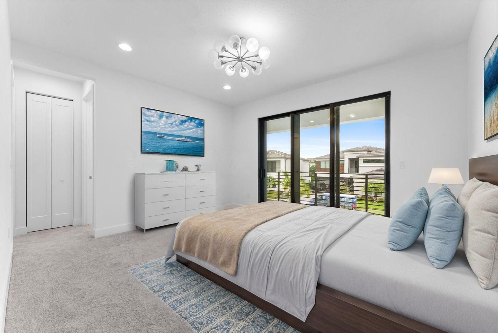 20107 Pacific Dunes Drive Boca Raton, FL 33434 - Photo 39 of 85 a bedroom with a large bed and a large window