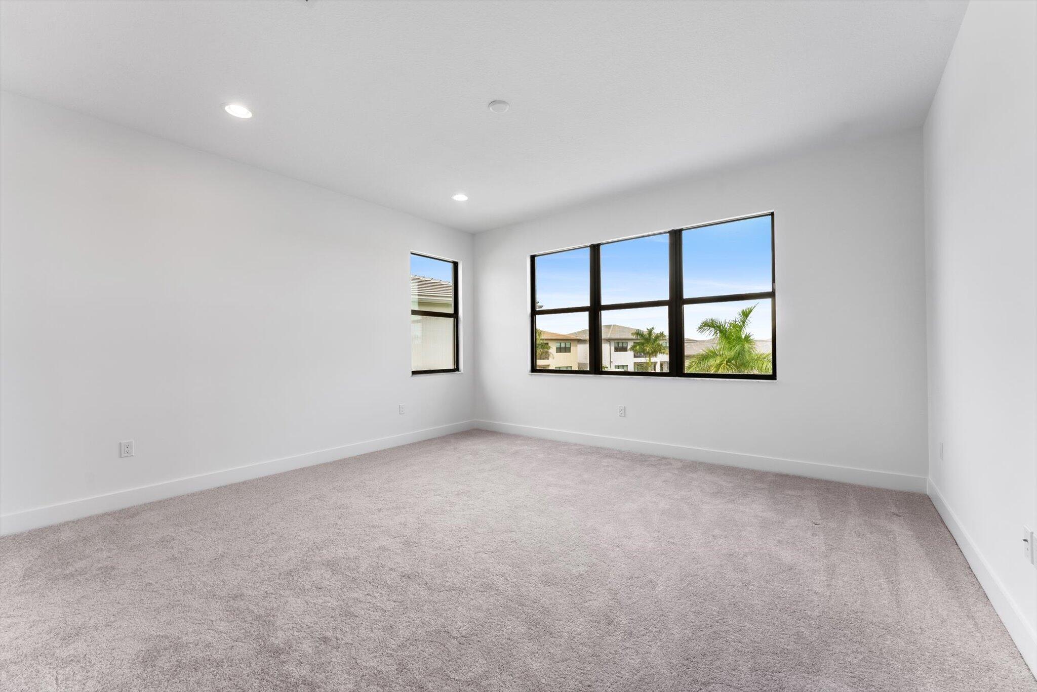 20107 Pacific Dunes Drive Boca Raton, FL 33434 - Photo 46 of 85 an empty room with windows