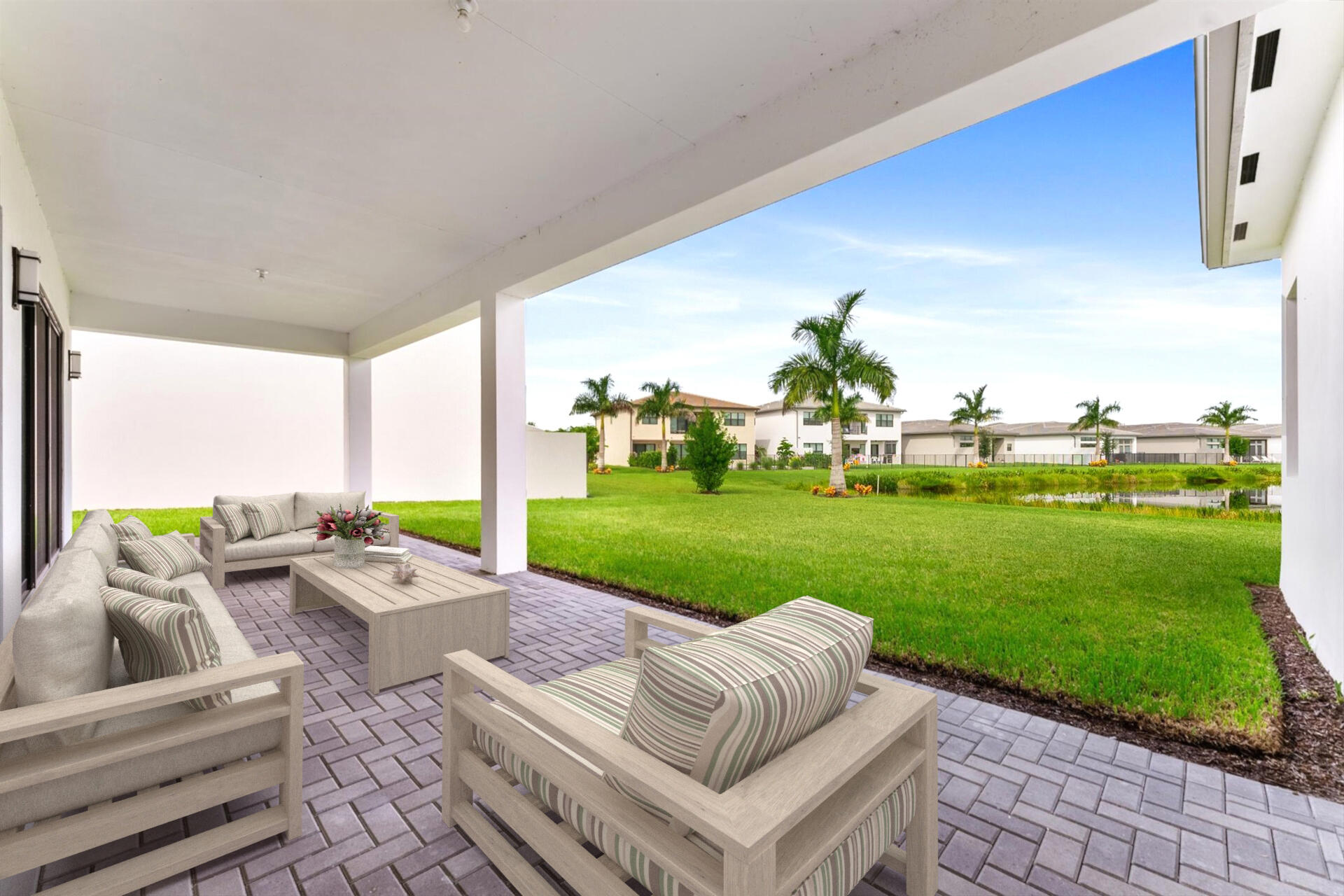 20107 Pacific Dunes Drive Boca Raton, FL 33434 - Photo 57 of 85 a view of a patio with couches plants and big yard