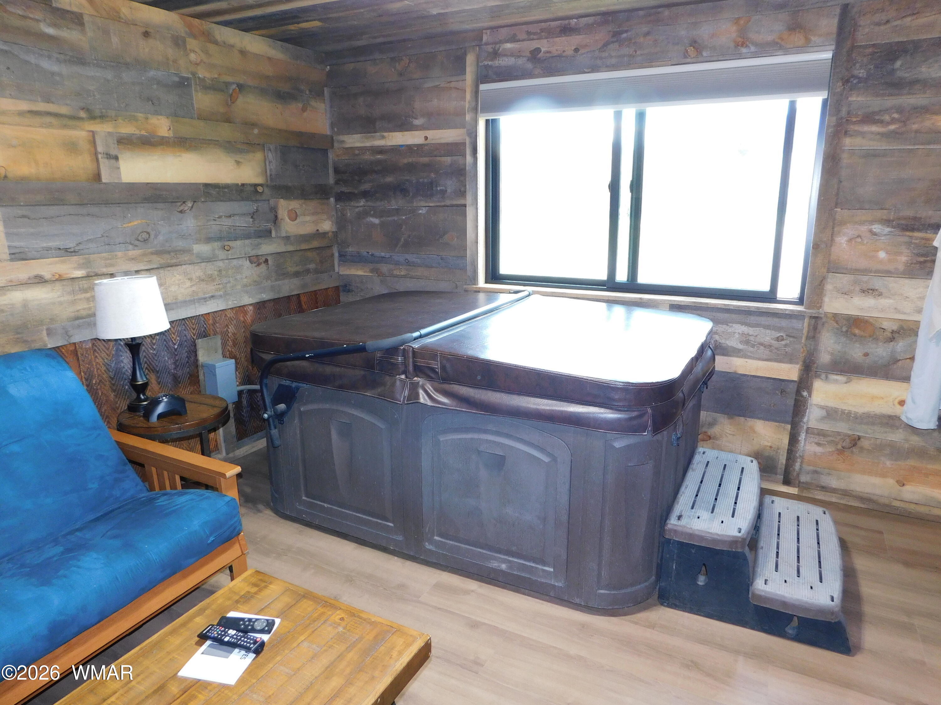85 Main Street Greer, AZ 85927 - Photo 43 of 55 a living room with furniture and a window