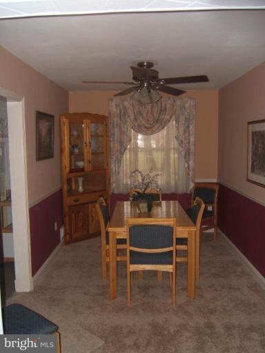 8038 Kavanagh Road Dundalk, MD 21222 - Photo 9 of 10 a dining room with furniture and window