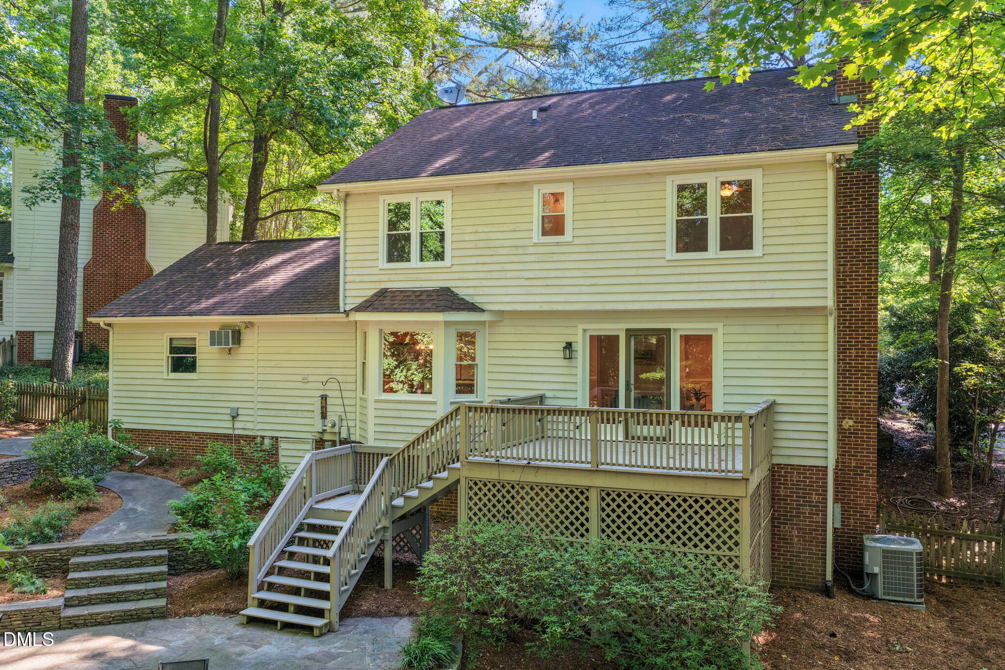 18 Strawberry Ridge Lane Durham, NC 27713 - Photo 43 of 59 a front view of a house with a garden