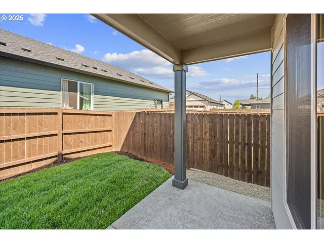 a view of a backyard with a garden