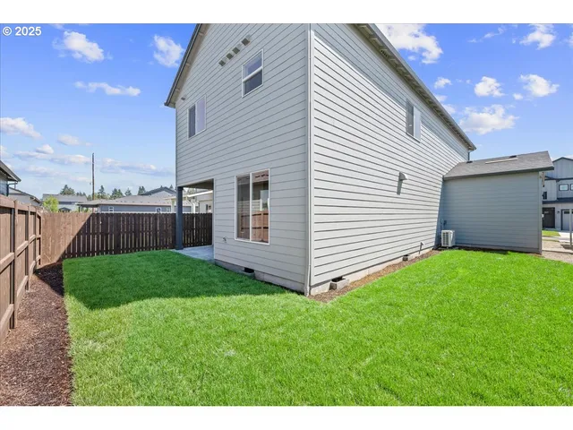 a view of a backyard with garden