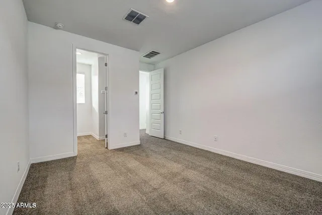an empty room with an entryway