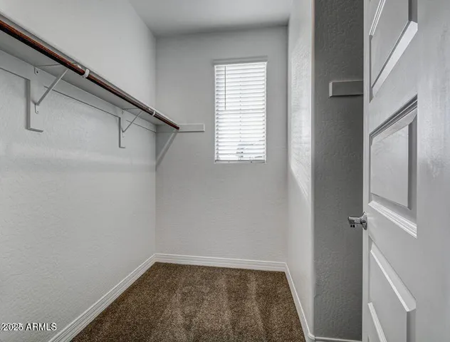 a view of small space with racks on the wall