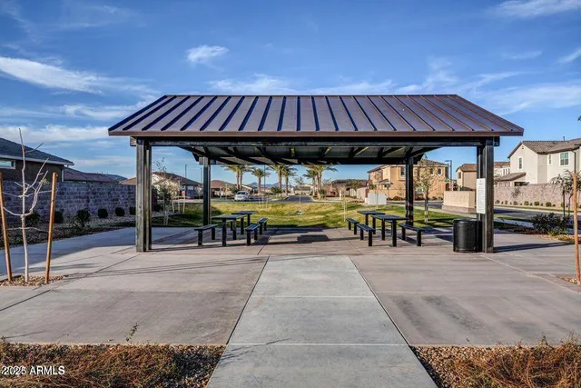 a view of a swimming pool with a patio