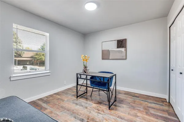 a workspace with furniture and window