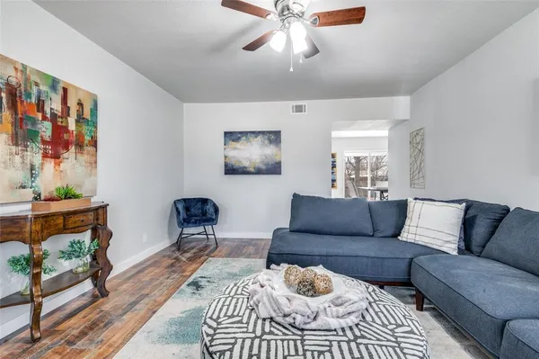 a living room with furniture and a couch