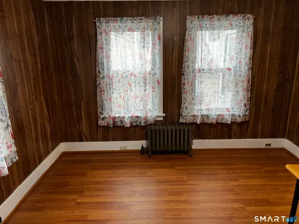 a view of wooden floor and staircase