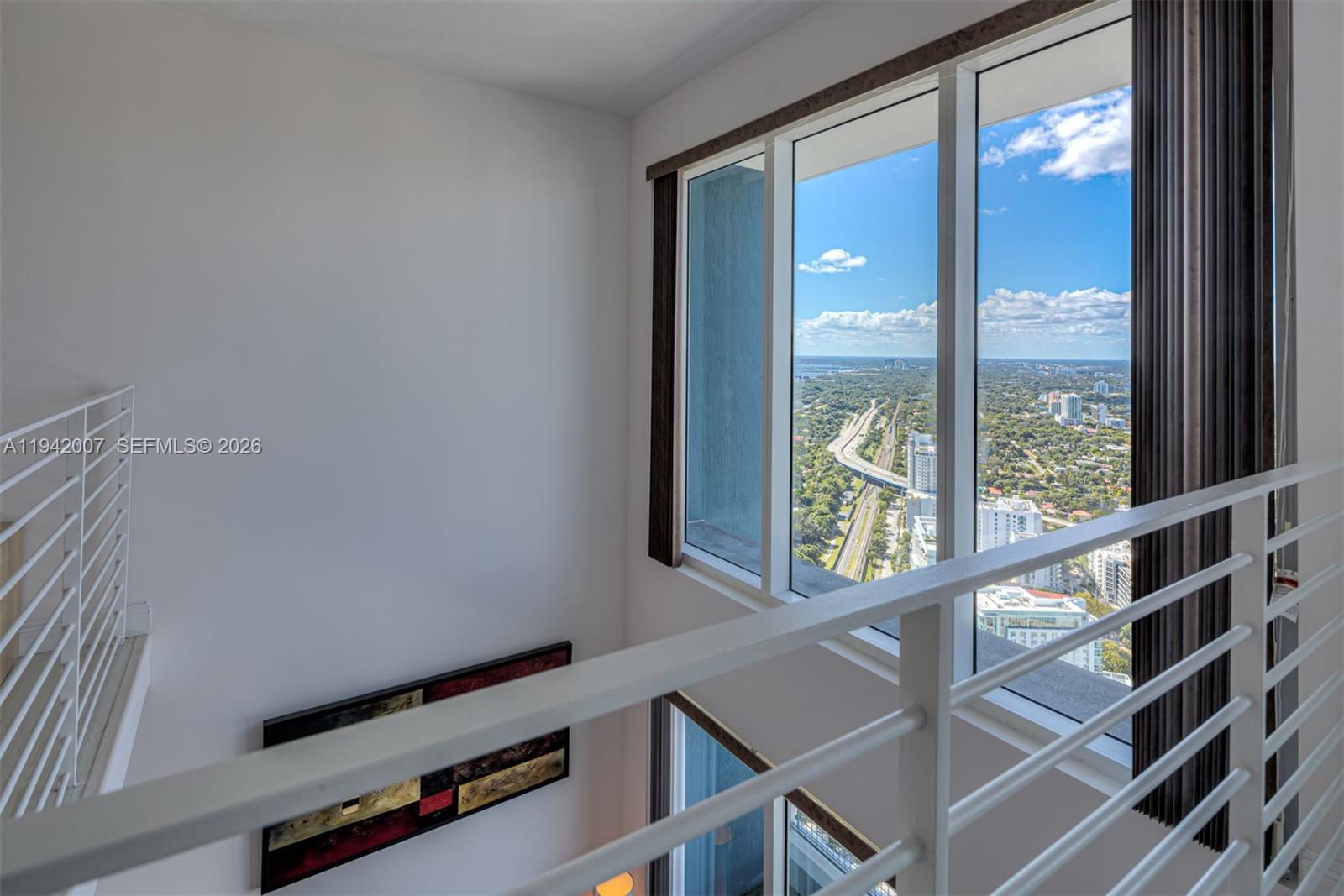 60 Southwest 13th Street, Unit 4211 Miami, FL 33130 - Photo 15 of 17 a view of a balcony with an outdoor space