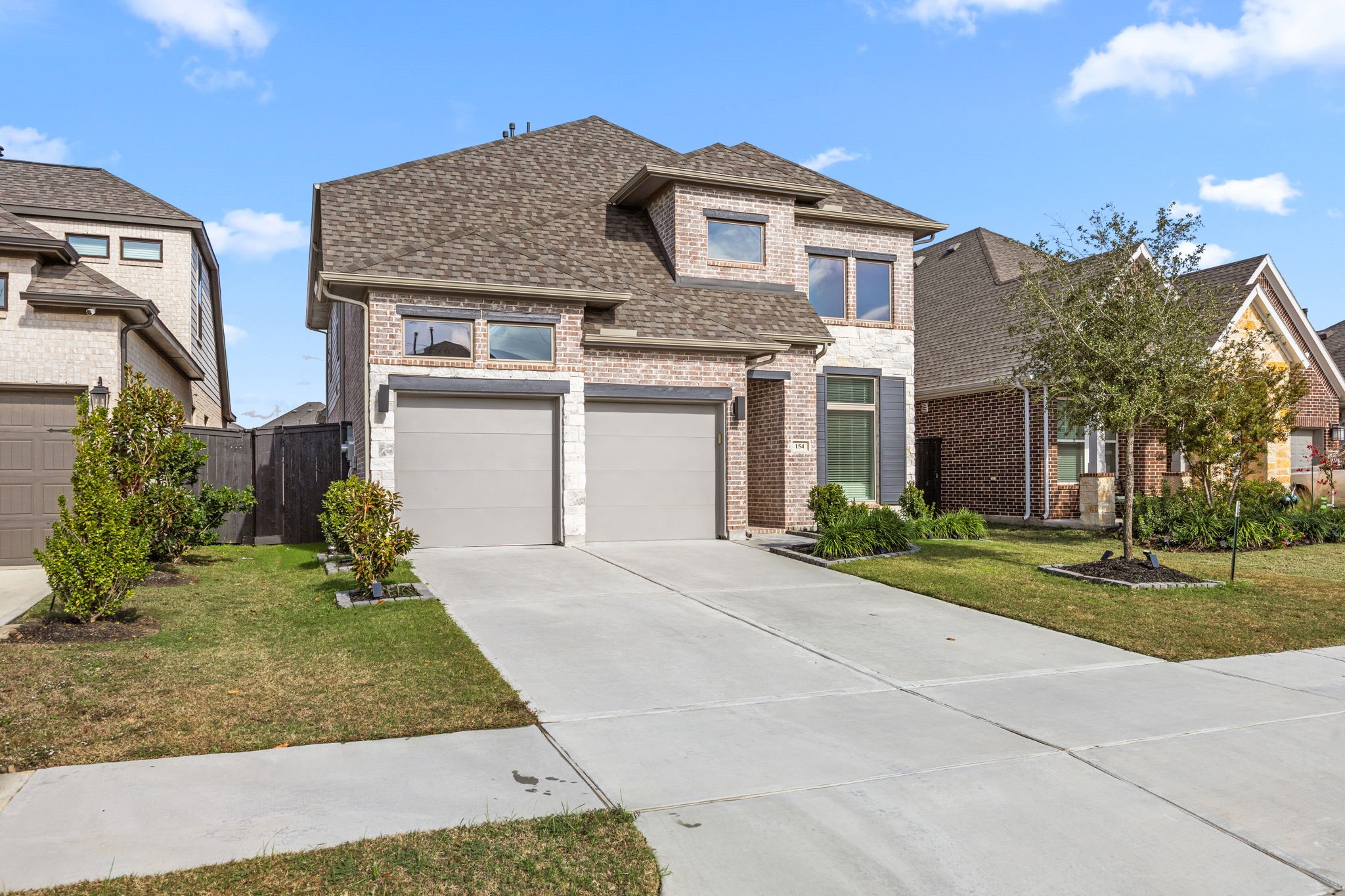 154 Amaranth Way Richmond, TX 77406 - Photo 2 of 37 front view of a house with a yard