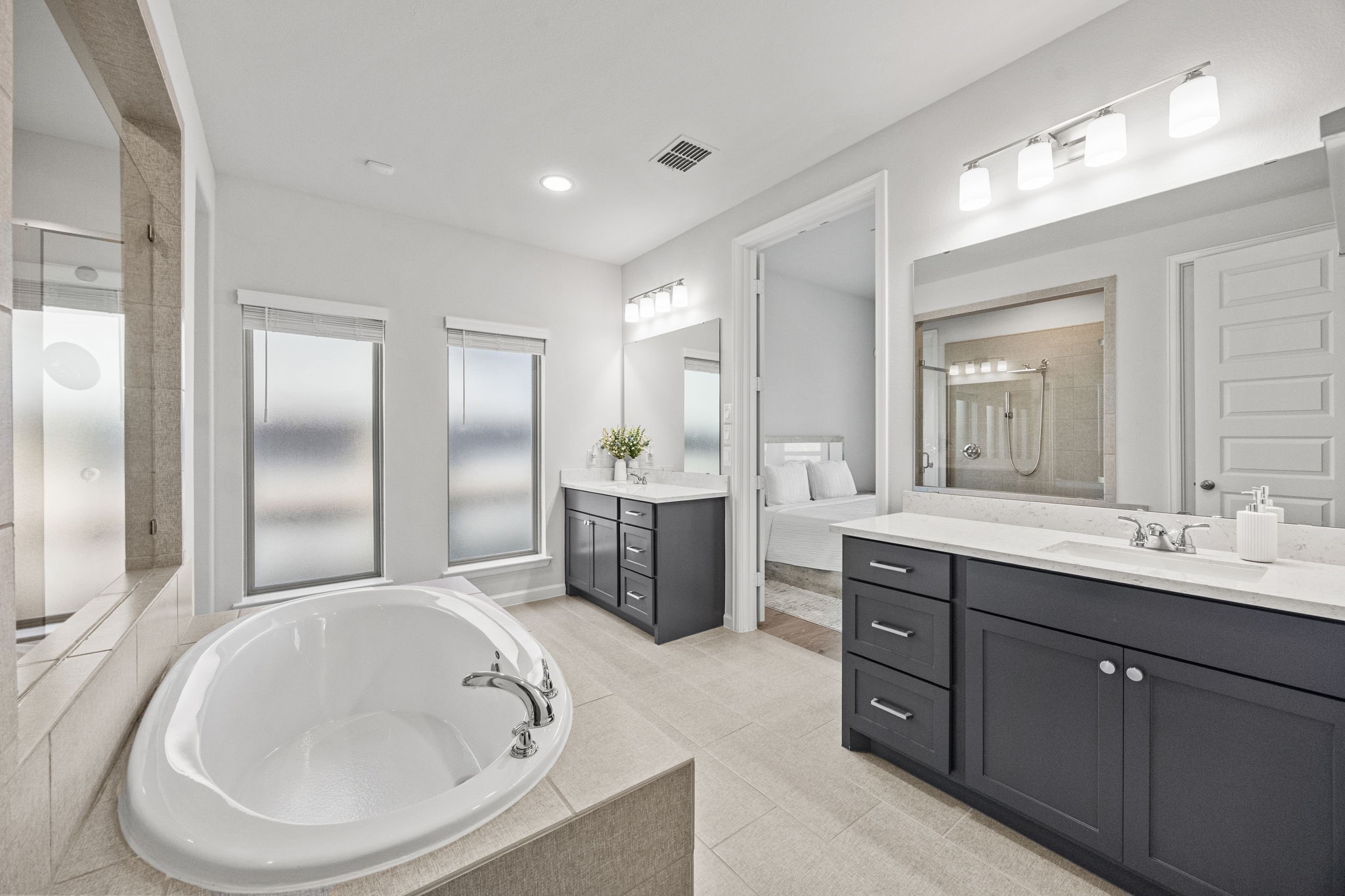 154 Amaranth Way Richmond, TX 77406 - Photo 23 of 37 a bathroom with a bathtub shower sink and toilet